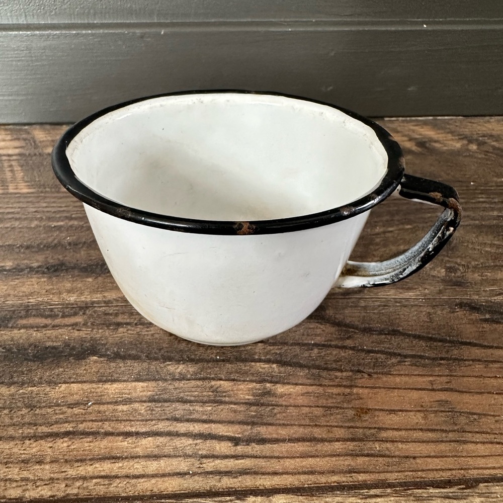 Rare vintage enamelware black and white cup.